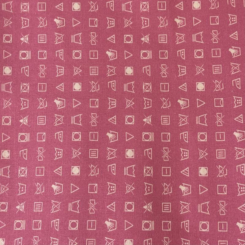 Vaskeanvisning på rosa